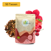 Der Geheimtipp Freches Früchtchen Tee Verpackung aus Papier mit losem Hibiskus Hagebutte Beeren Früchtetee im Hintergrund