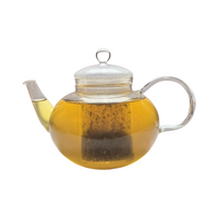 Teekanne aus Glas mit flüssigem Mate Apfel Birne Matetee