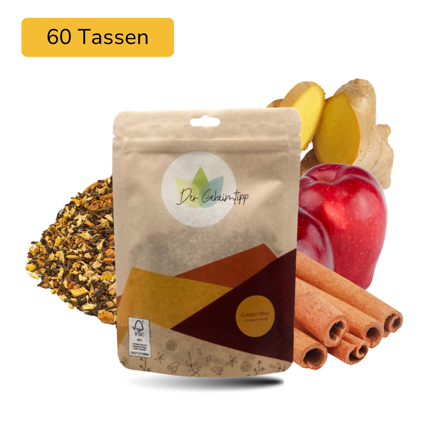 Der Geheimtipp Golden Hour Tee Verpackung aus Papier mit losem Apfel Zimt Kardamom Chai Tee im Hintergrund