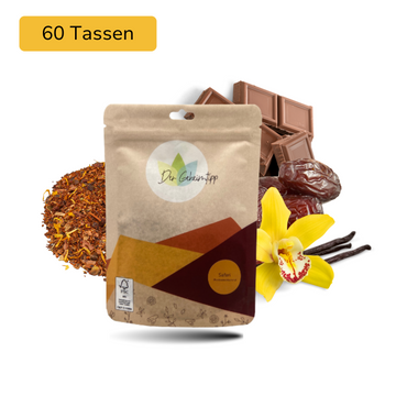 Der Geheimtipp Safari Tee Verpackung aus Papier mit losem Schoko Vanille Rooibos Tee im Hintergrund