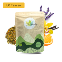 Der Geheimtipp Schafe zählen Tee Verpackung aus Papier mit losem Orange Vanille Lavendel Kräutertee im Hintergrund